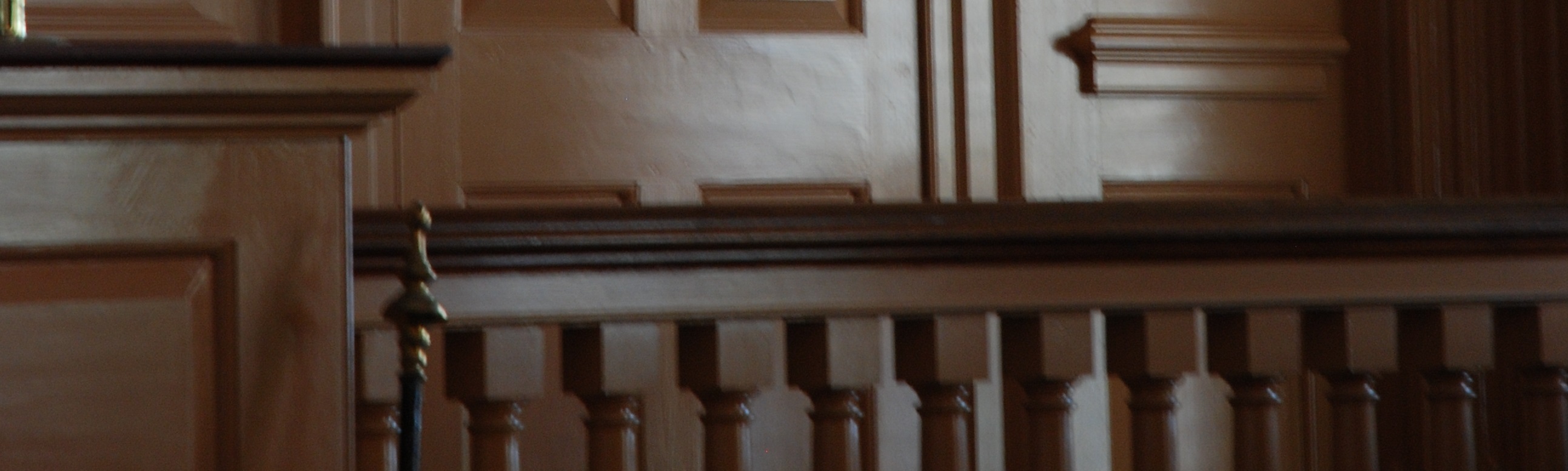 A Wooden Frame With Walls in a Court Room One