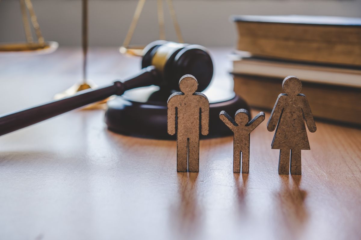 A Wooden Figurines of People on a Table